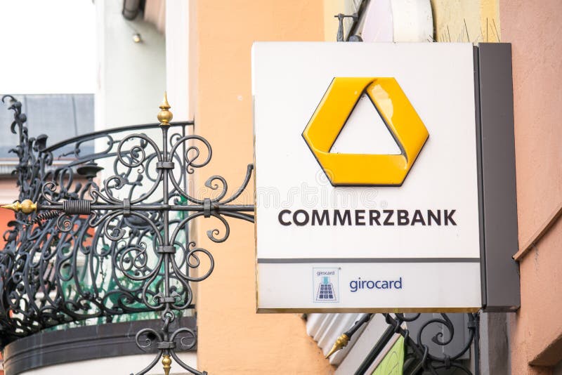 Sign above a german Commerzbank with copy space to the left. Sign above a german Commerzbank with copy space to the left