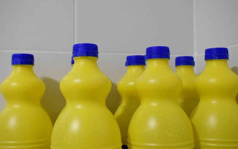 Common Bleach Bottles in Yellow and Blue Stock Image Image of bleach