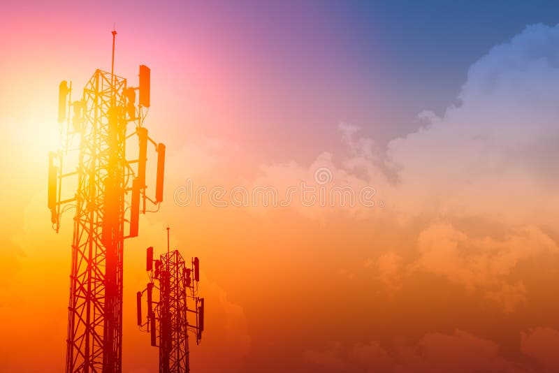 Communication tower or 3G 4G network telephone cellsite with dusk sky with space for text