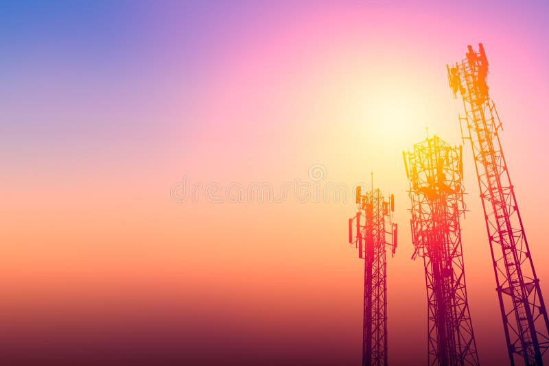 Communication tower or 3G network telephone cellsite with dusk sky with space for text