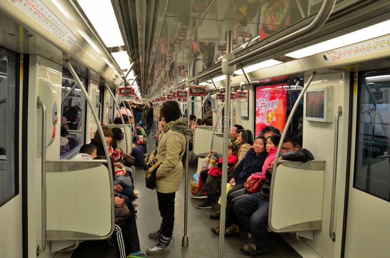 Commuters Inside A Shanghai Metro Train Railway Carriage ...