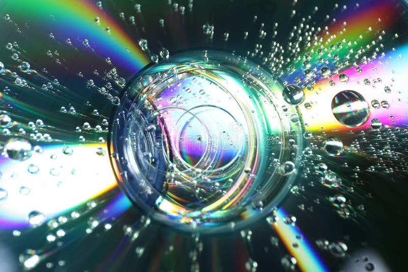 Compact discs with drops as background, closeup royalty free stock photos