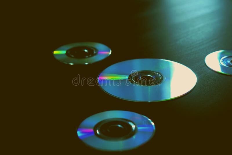 Compact-discs op de achtergrond stock fotografie Compact-discs op de achtergrond stock fotografie