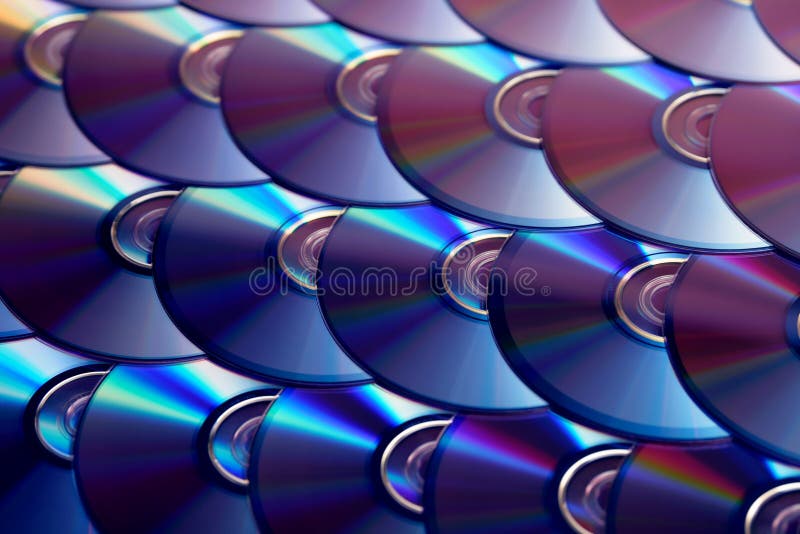 Compact-discsachtergrond Verscheidene schijven blu-Ray van CD dvd Optische recordable of rewritable digitale gegevensopslag royalty-vrije stock foto Compact-discsachtergrond Verscheidene schijven blu-Ray van CD dvd Optische recordable of rewritable digitale gegevensopslag royalty-vrije stock foto