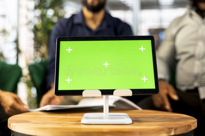 Company director showing shareholders data on chroma key device, close up stock image