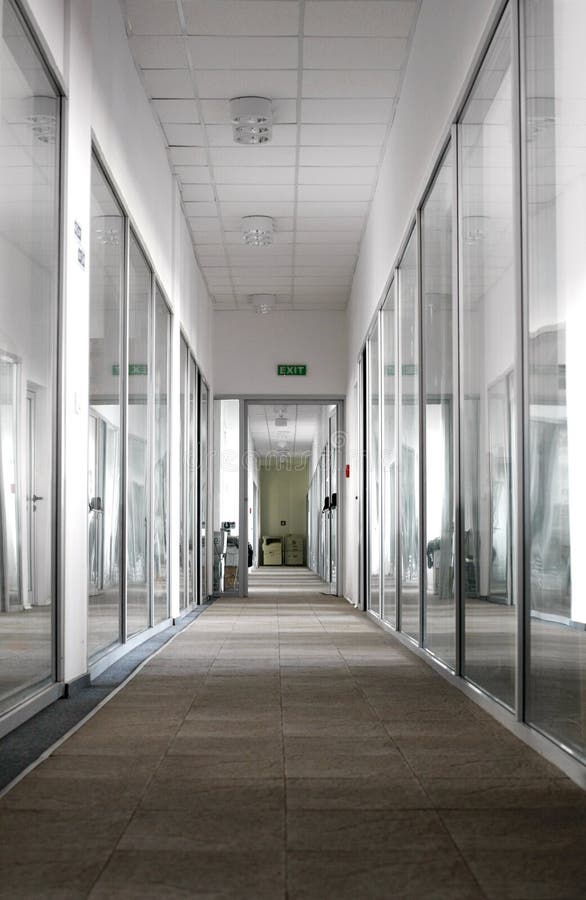 Empty company hall interior in a office building with glass walls. Empty company hall interior in a office building with glass walls