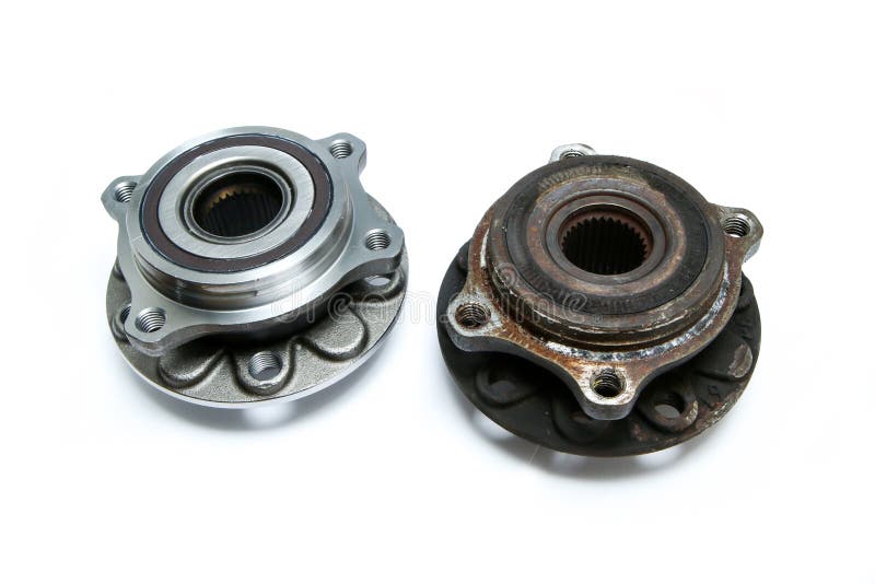 The New Shiny and Old Rusty and Broken Car Wheel Bearings Stock Image