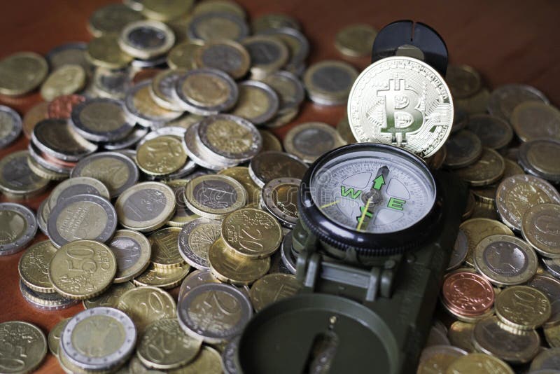 Compass e Bitcoin - trovare la strada immagini stock