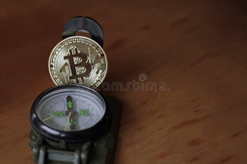 Compass e Bitcoin - trovare la strada immagini stock libere da diritti
