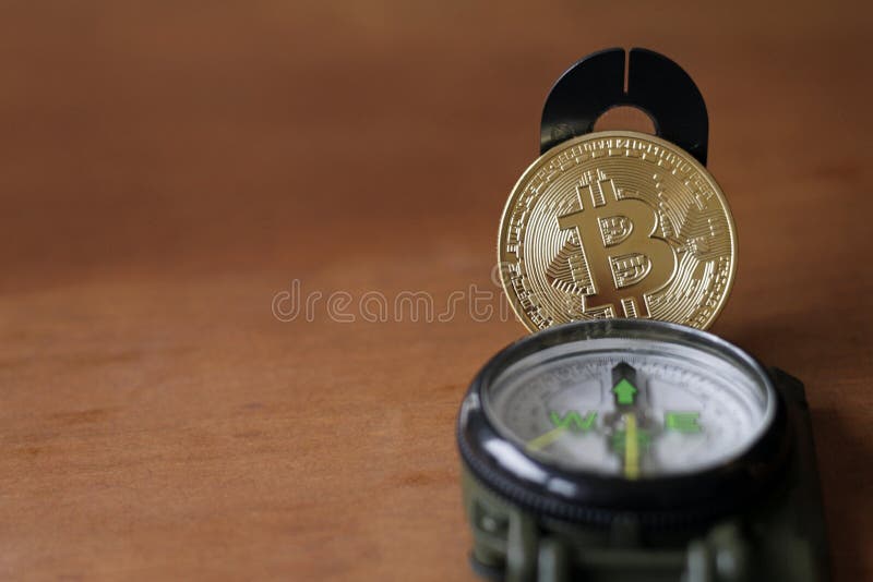 Compass e Bitcoin - trovare la strada fotografie stock