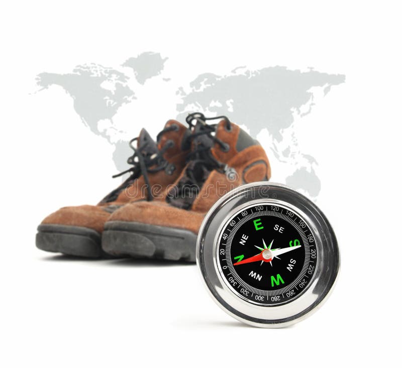 Compass and hiking shoes stock photo. Image of travel 36839966