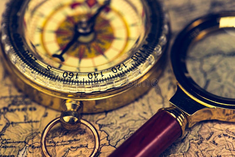 Compass and magnifying glass