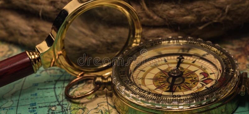 Compass and magnifying glass