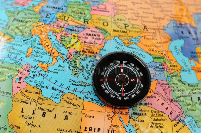 Compass on map of Europe stock photo. Image of adventure 34347964