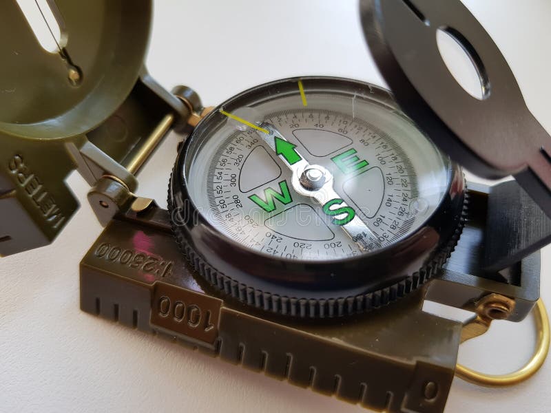 The Compass Needle Points North Stock Photo Image of city, blue