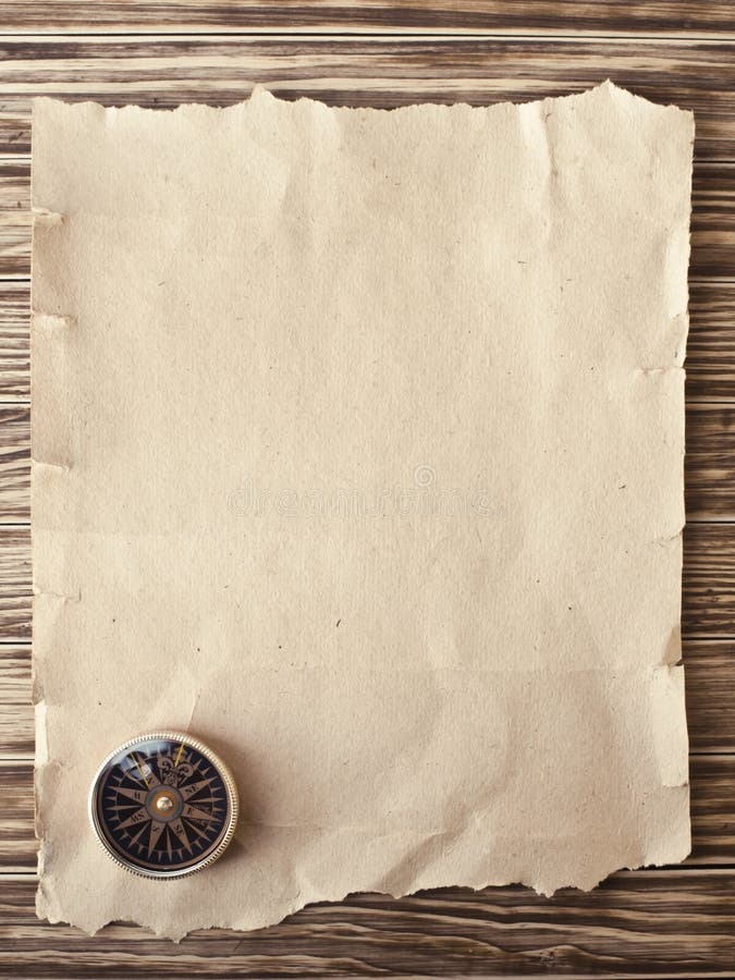 Compass on the old paper background