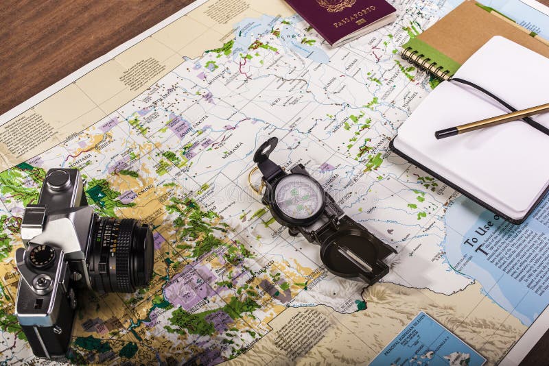 Compass, Passport, Photo Camera and Block Notes on Map Stock Photo ...