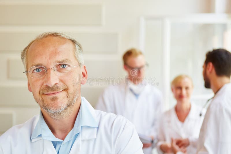 Competent senior doctor royalty free stock images