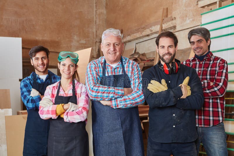 Competent and successful team of carpenters stock photography