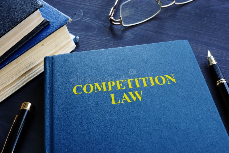 Competition law and pen on a table. royalty free stock image Competition law and pen on a table. royalty free stock image