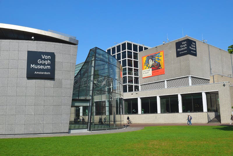 Amsterdam, the Netherlands - May 20, 2018: Van Gogh museum building complex at the Museum Square in Amsterdam, the Netherlands. Poster announcing the exhibition `Van Gogh and Japan`. Amsterdam, the Netherlands - May 20, 2018: Van Gogh museum building complex at the Museum Square in Amsterdam, the Netherlands. Poster announcing the exhibition `Van Gogh and Japan`