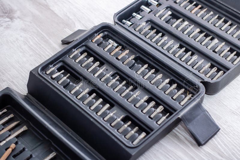 A complete set of assorted screwdriver bits neatly housed in a black case royalty free stock photo