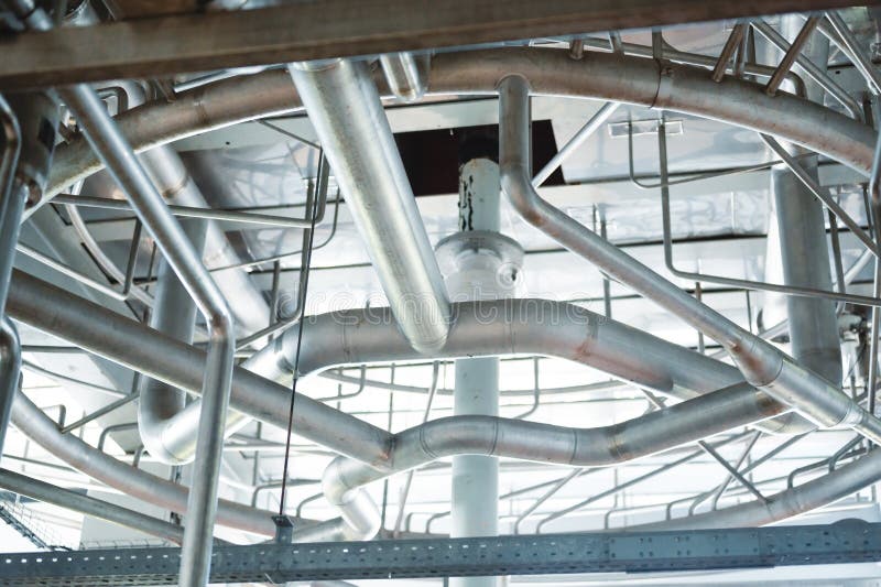 Heavy duty steel pipelines for pumping liquids. royalty free stock photography
