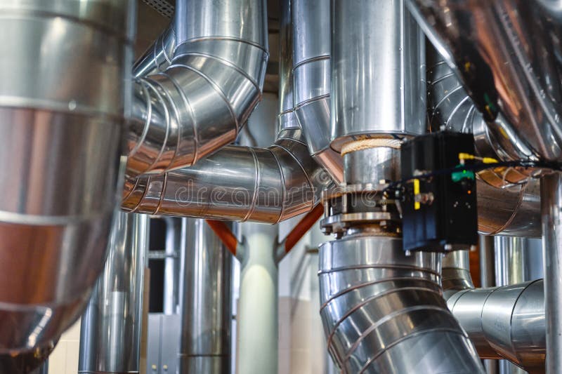 Heavy duty steel pipelines for pumping liquids. stock photos