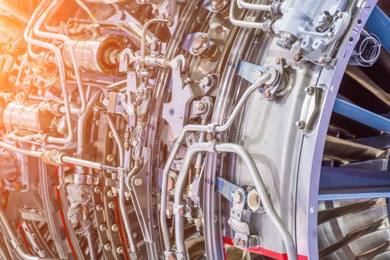 The complex mechanism of tubes and other binder systems in an airplane jet engine, close-up view. Industrial Production