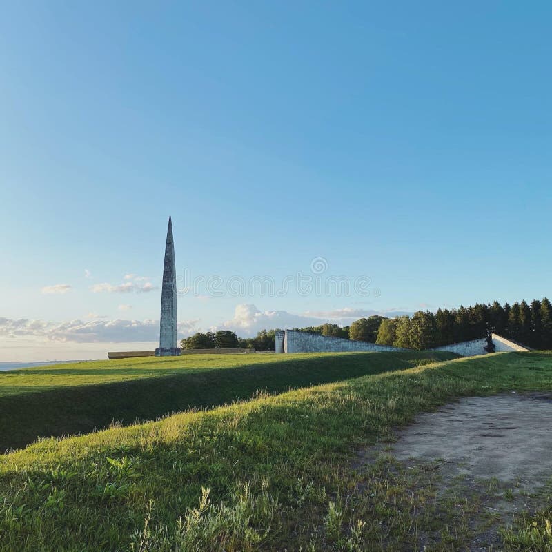 Abandoned memorial complex in Estonia at sunset. Reconciliation Square. Concrete monument in the style of soviet brutalism. Photo. Abandoned memorial complex in Estonia at sunset. Reconciliation Square. Concrete monument in the style of soviet brutalism. Photo.