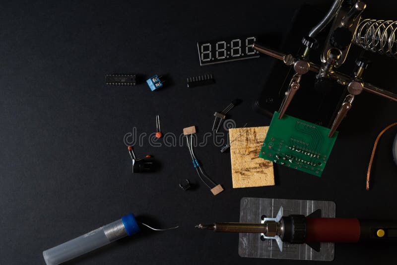 The components of the main board in the process of assembling the finished device for further use. stock photos
