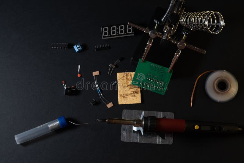 The components of the main board in the process of assembling the finished device for further use. stock photography