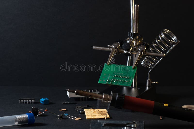 The components of the main board in the process of assembling the finished device for further use. royalty free stock photos