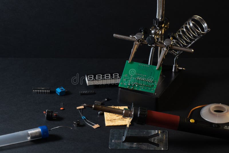 The components of the main board in the process of assembling the finished device for further use. royalty free stock photos