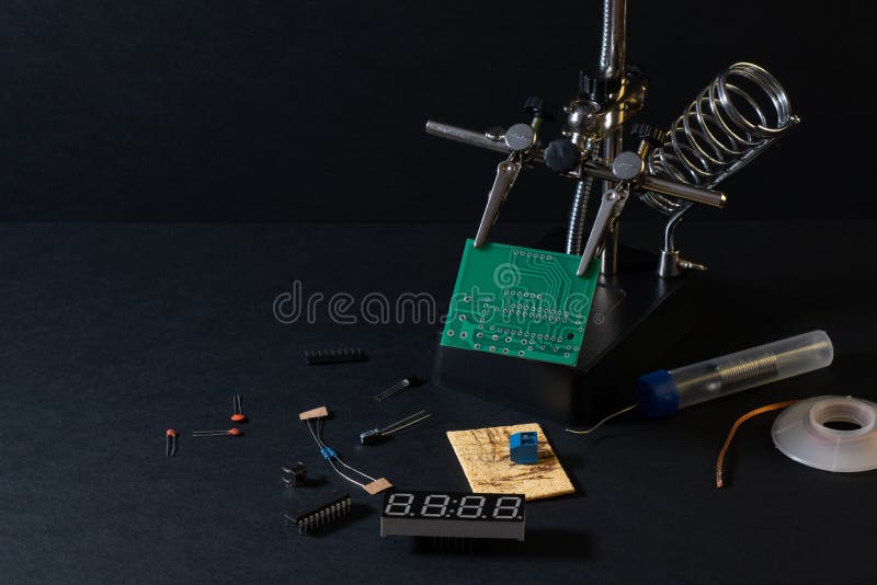 The components of the main board in the process of assembling the finished device for further use. royalty free stock photos