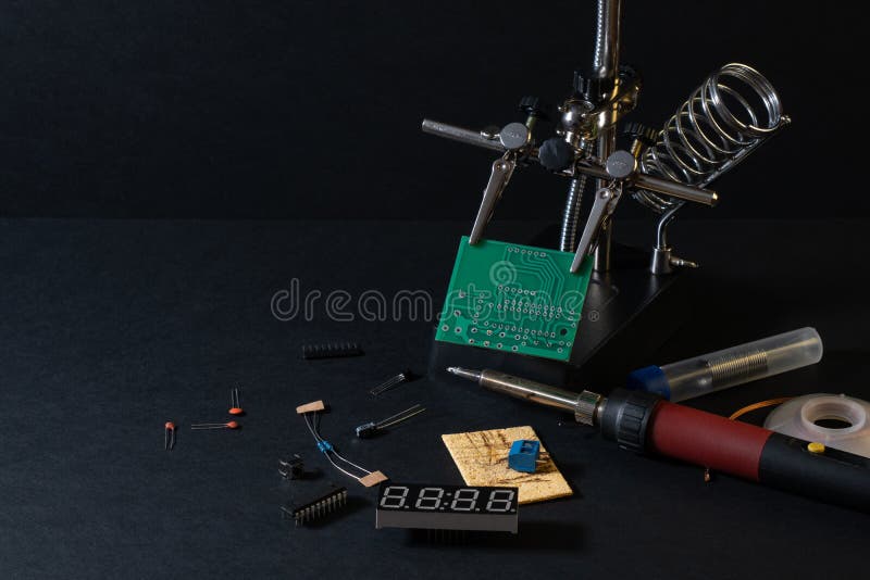 The components of the main board in the process of assembling the finished device for further use. royalty free stock photography