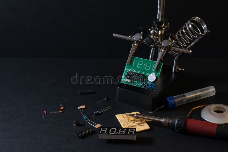 The components of the main board in the process of assembling the finished device for further use. stock image