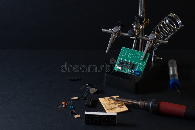 The components of the main board in the process of assembling the finished device for further use. royalty free stock photos