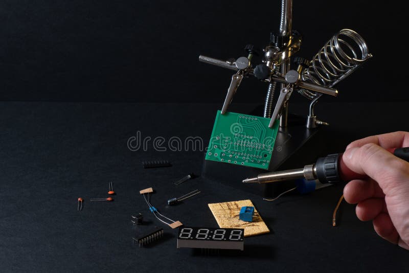 The components of the main board in the process of assembling the finished device for further use. royalty free stock images