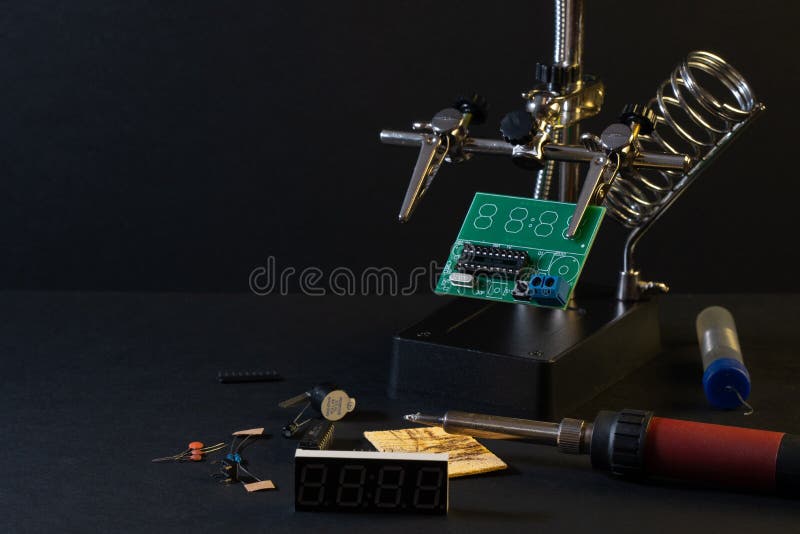 The components of the main board in the process of assembling the finished device for further use. stock photography