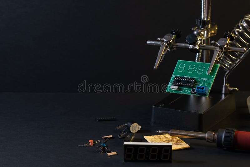 Modern technologies. The components of the main board in the process of assembling the finished device for further use.
