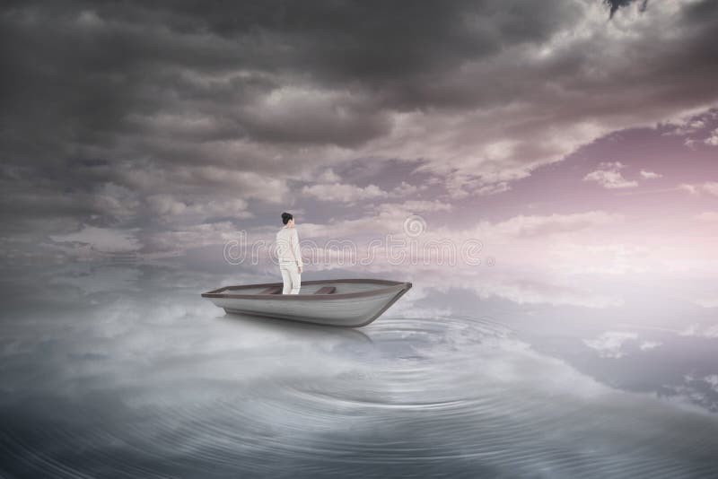 Composite image of asian businesswoman in a sailboat stock image Composite image of asian businesswoman in a sailboat stock image