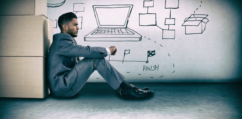 Businessman leaning on cardboard boxes against white background against grey room. Businessman leaning on cardboard boxes against white background against grey room