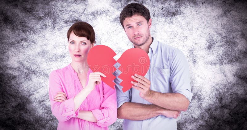 Composite image of couple holding a broken heart royalty free illustration Composite image of couple holding a broken heart royalty free illustration