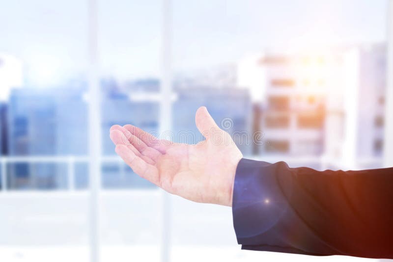 Composite image of cropped hand of male executive showing hand stock images Composite image of cropped hand of male executive showing hand stock images
