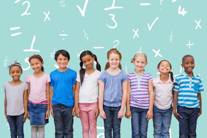 Composite image of cute pupils smiling at camera in classroom stock photos