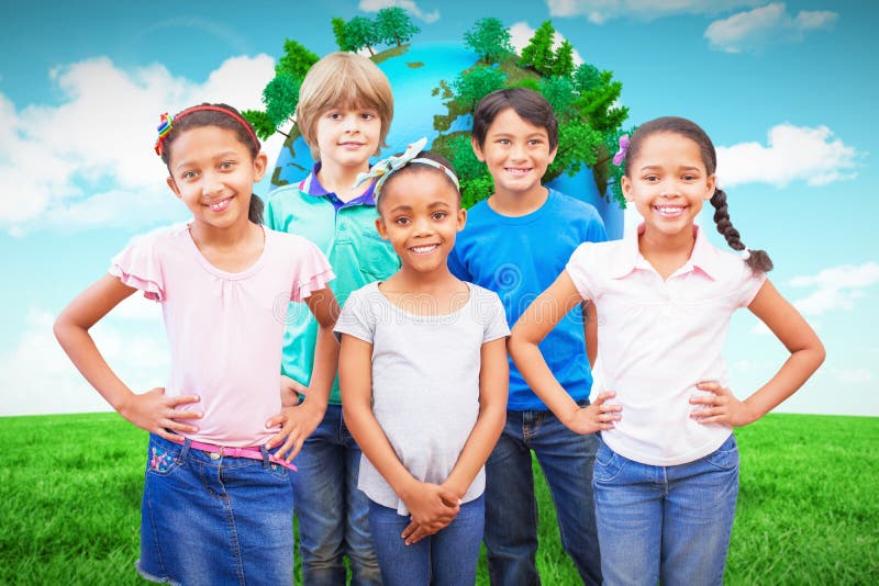 Composite image of cute pupils smiling at camera in classroom stock photography