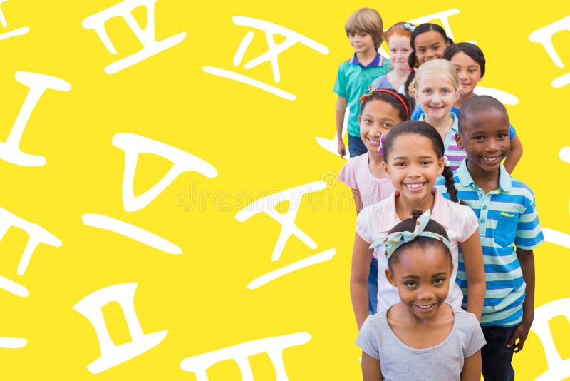 Composite image of cute pupils smiling at camera in classroom royalty free stock photos