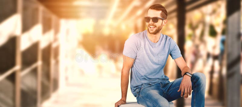 Composite image of full length of male model on seat stock photos Composite image of full length of male model on seat stock photos