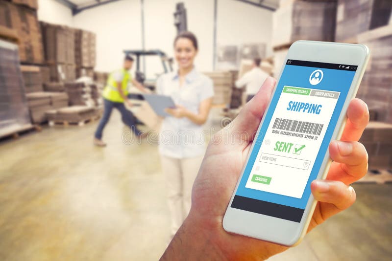 Composite image of hand holding smartphone stock images